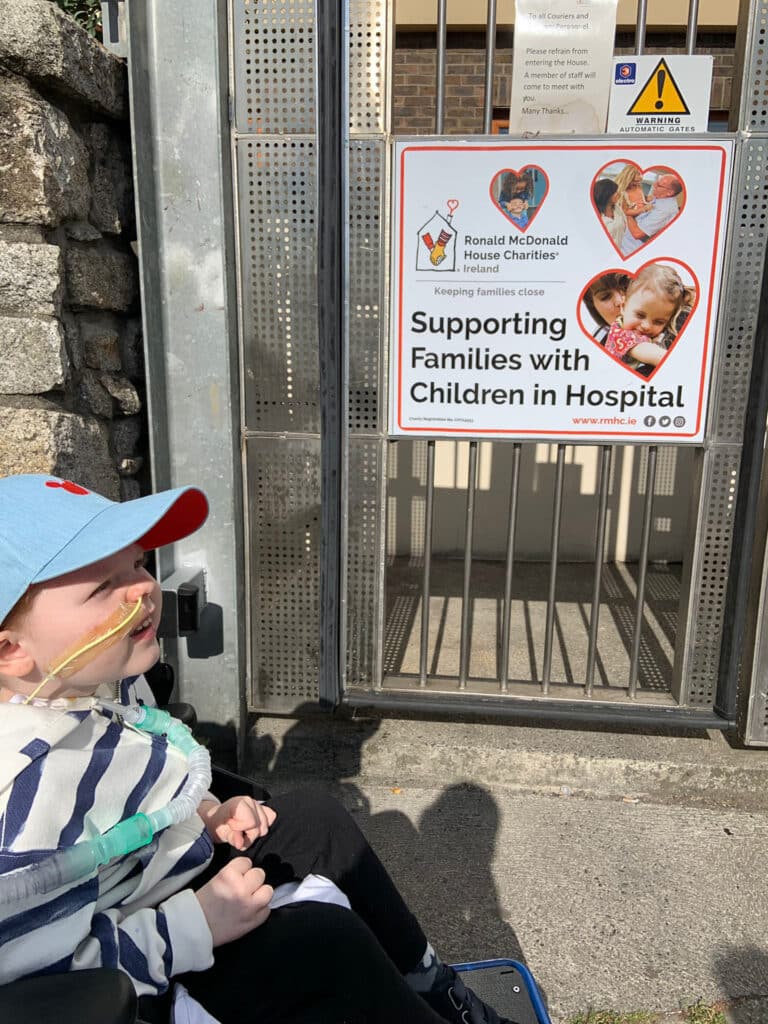 Kian at entrance of RMHC
